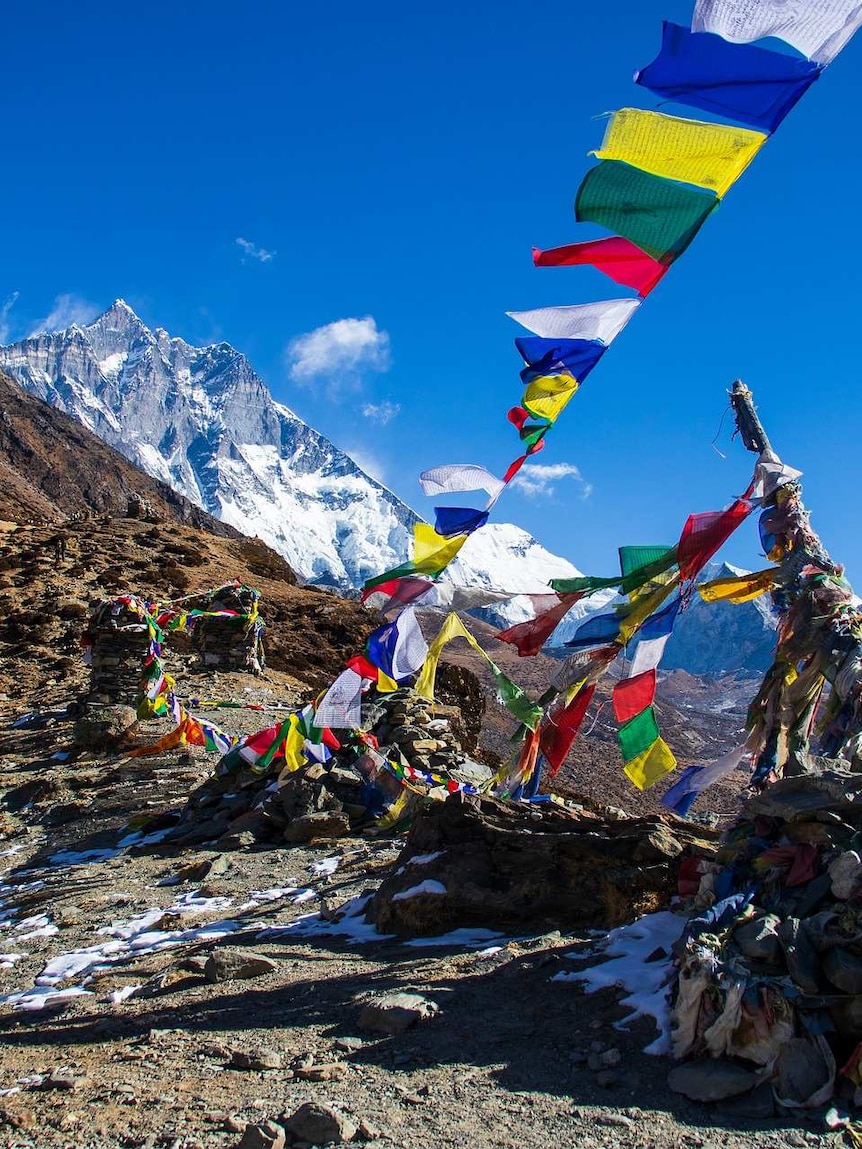 Photo shows prayer flags in the Himalayas in Nepal.