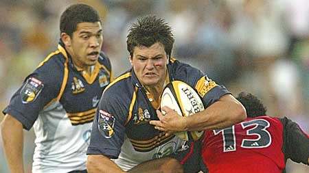 Adam Ashley-Cooper being tackled