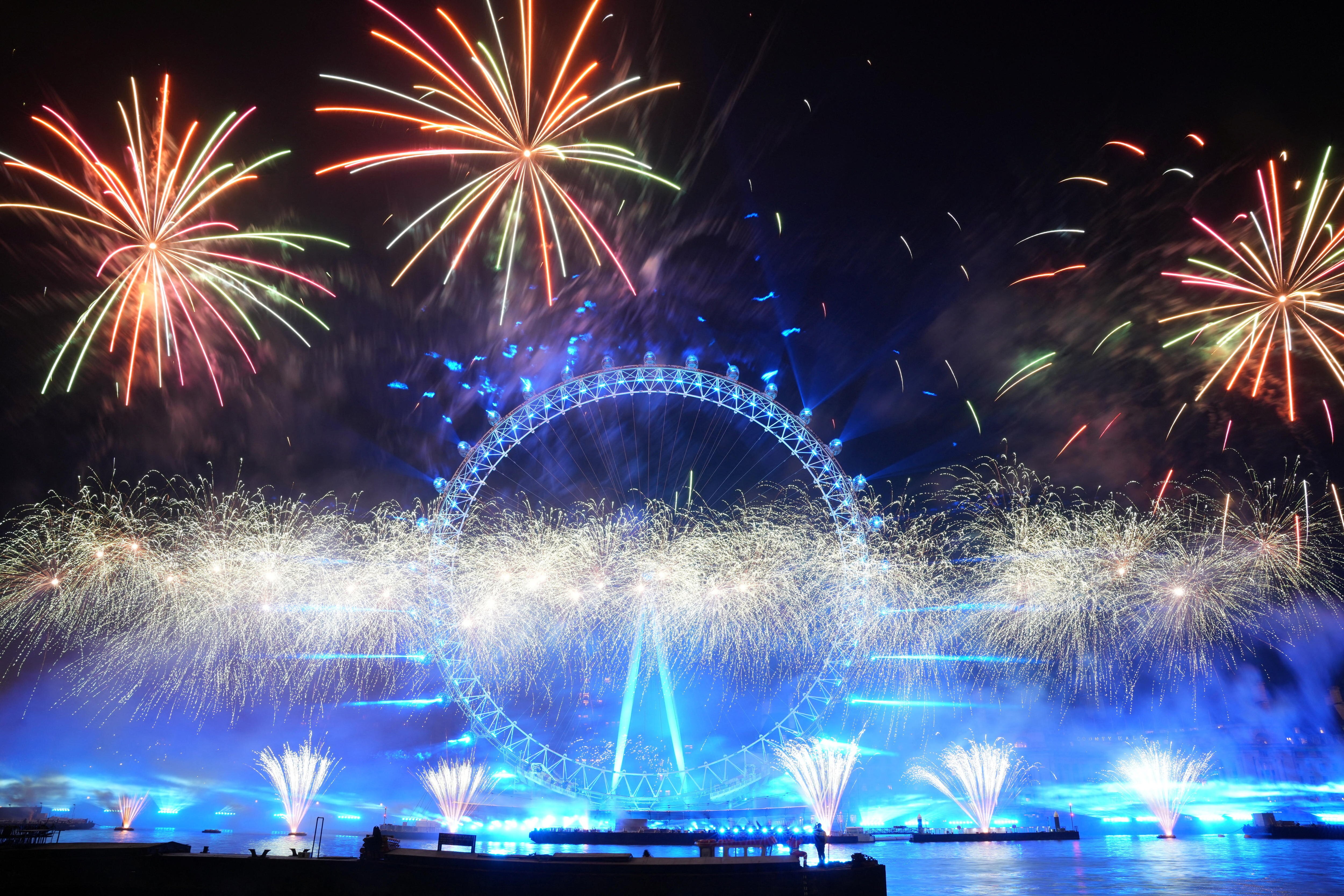 World rings in new year, from the London Eye to Egypt's pyramids