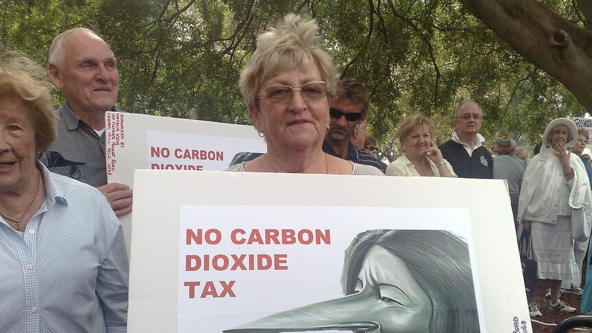 A placard showing a derogatory caricature of Julia Gillard