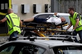 Ambulans membawa korban luka ke rumah sakit. Dua WNI jadi korban tembak dalam teror di Christchurch ini.