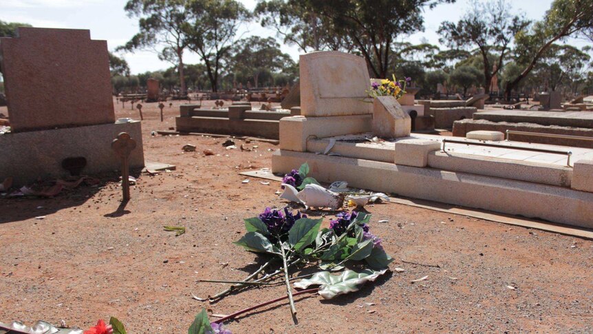 Damage to grave sites at Kalgoorlie Cemetery by juvenile vandals last week.