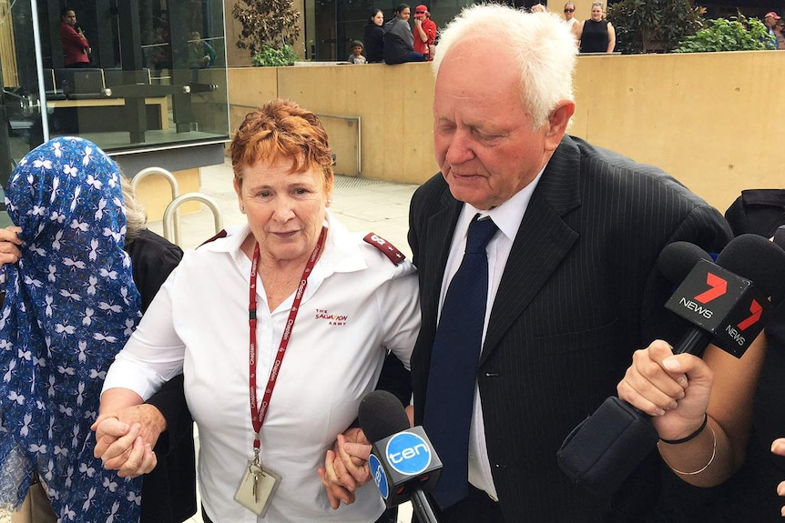 Greyhound trainer Tom Noble and his wife outside Ipswich Magistrates Court in September.