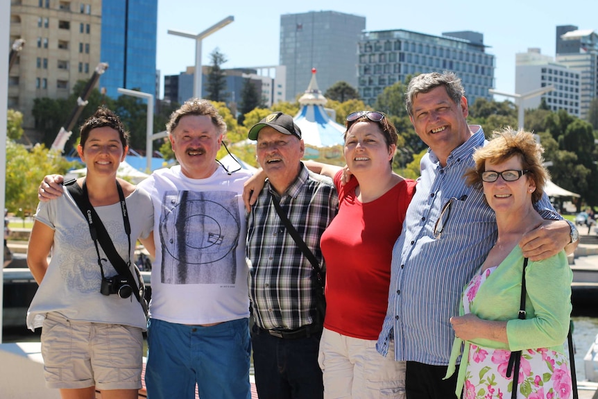 Paddy Cannon standing with his Irish family at Elizabeth Quay in Perth