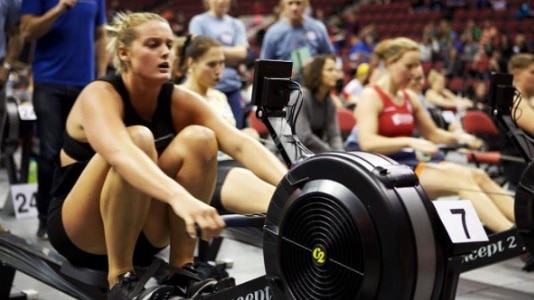 Australian rower Georgie Rowe on an indoor rowing machine.