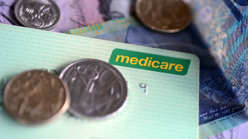 Coins on a Medicare card.