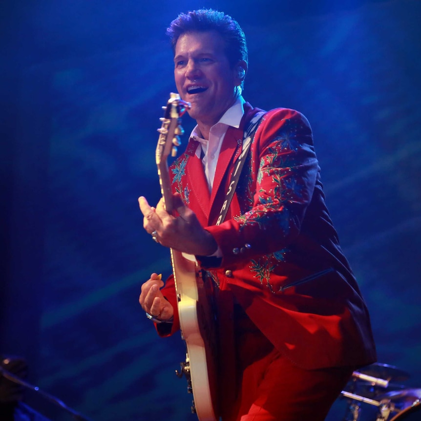 Chris Isaak performing live on stage