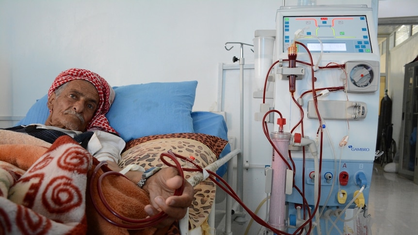 Patients with renal failure outside a dialysis center in Yemen.