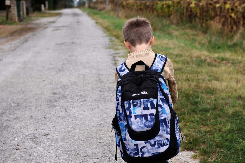 boy with his backpack