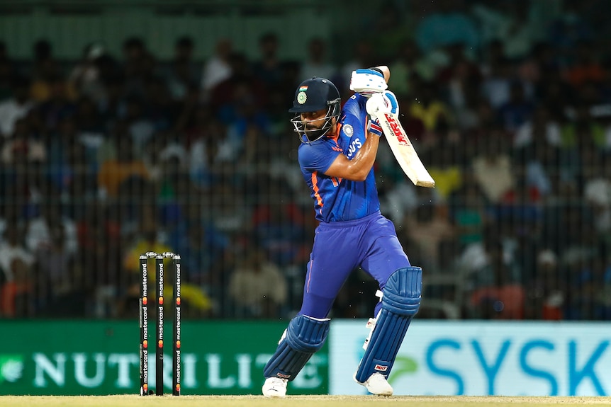 Cricketer Virat Koli plays shot.