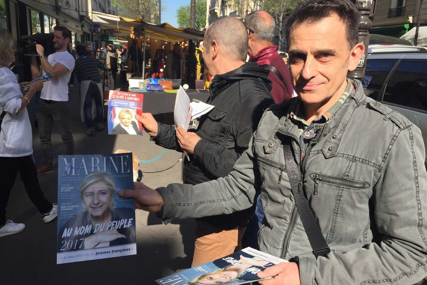 Jean-Francois Belmondo hands out Le Pen flyers