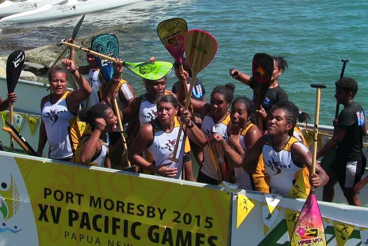 The PNG women’s V12 500m crew celebrate after winning va’a gold in Port Moresby