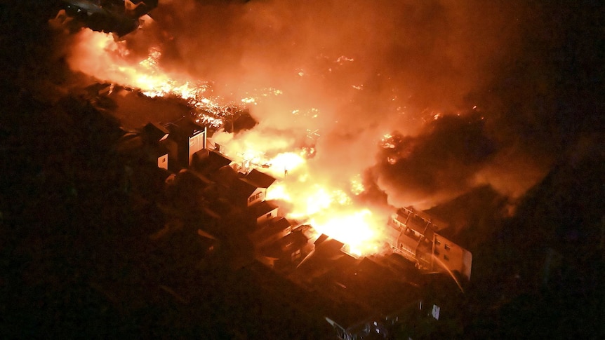 An aerial view shows fire site after an earthquake at a residential area in Wajima, Ishikawa prefecture, Japan.