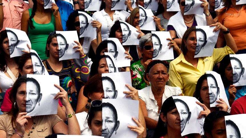 A group of women take part in a demonstration to protest against insecurity in Caracas.