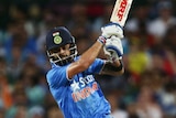 Virat Kohli plays a shot agains Australia