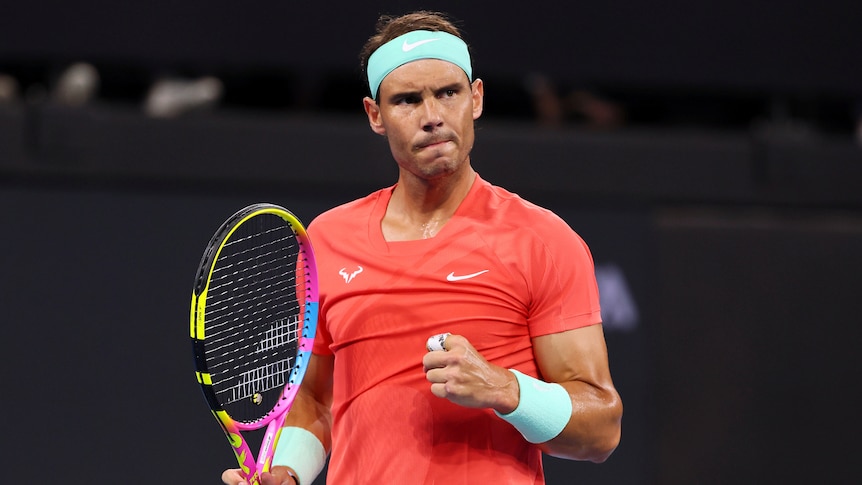Rafael Nadal holding a tennis racket at Brisbane International
