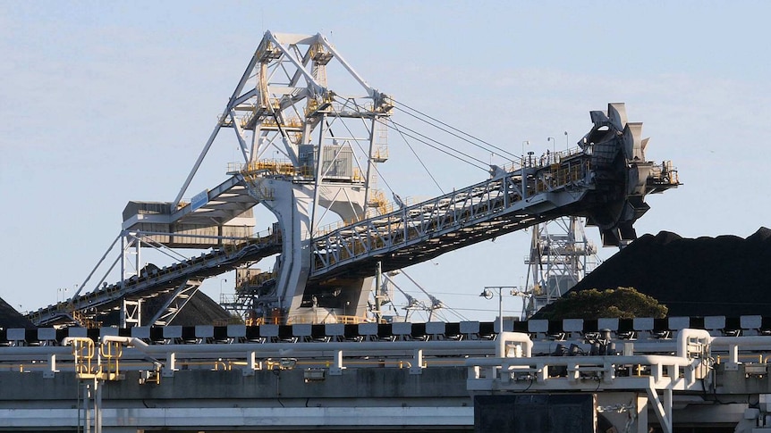 Coal is loaded onto ships.