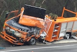 Crashed orange truck