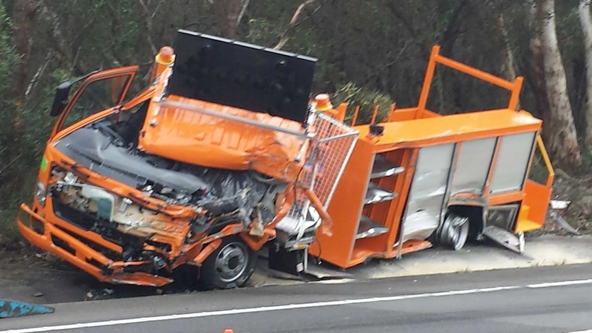 Crashed orange truck