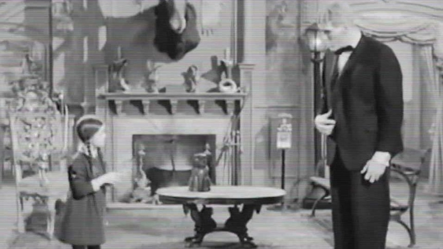 Wednesday Addams and Lurch dancing in the 1960s version of The Addams Family. 