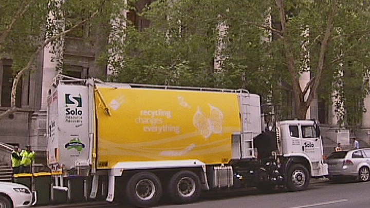 Garbage truck parked outside Parliament