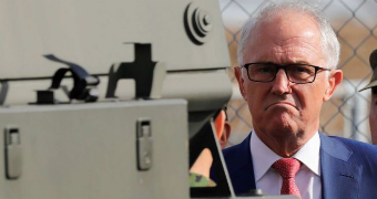 Malcolm Turnbull in the line of a bushmaster.