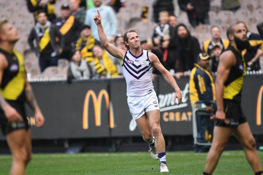 David Mundy points the finger after sinking Richmond