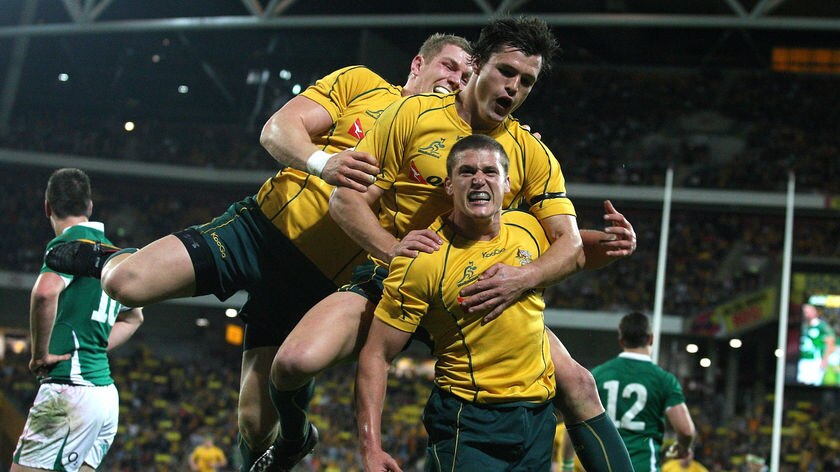 Luke Burgess celebrates scoring the opening try in Australia's Landsdowne Cup triumph.