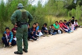 National Border Patrol agents intercept a group of migrants.