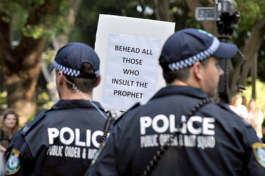 Placard calling for beheading