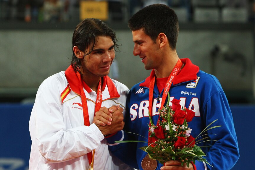 Rafael Nadal and Novak Djokovic shake hands