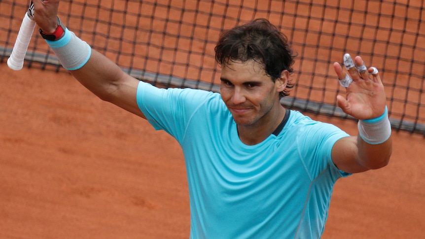 Spain's Rafael Nadal celebrates after beating Serbia's Dusan Lajovic at the French Open.