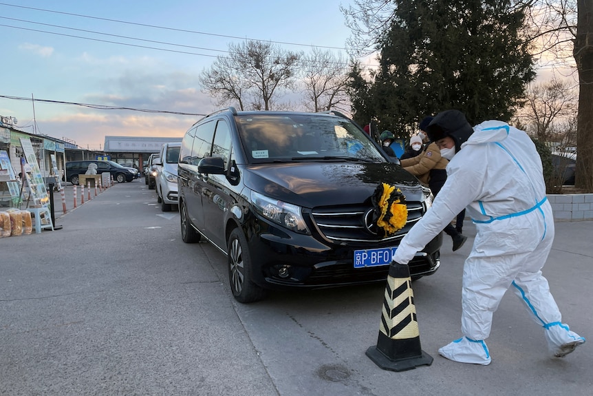 Hearses are seen lining up outside a Beijing funeral home