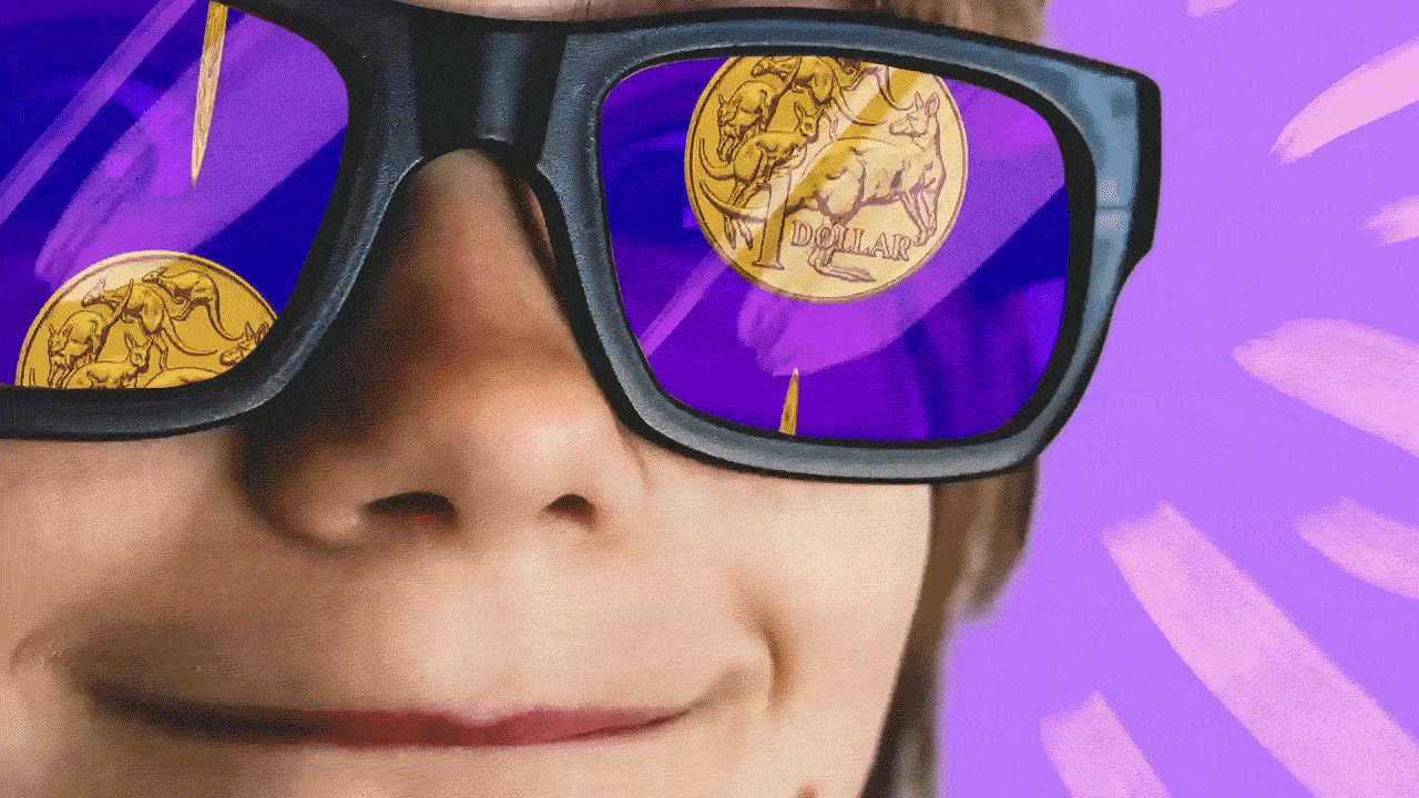 A boy wears sunglasses that reflect an image of one dollar coins for a story about giving kids pocket money.