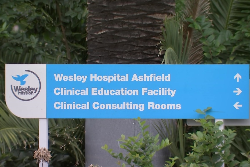 A sign for the Wesley Mission Hospital in Ashfield