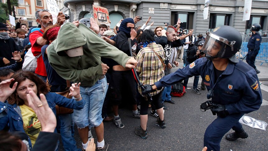 Police clash with protesters in Madrid