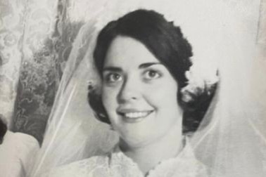 Black and white photo young dark haired woman in wedding dress