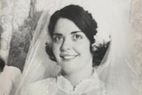 Black and white photo young dark haired woman in wedding dress