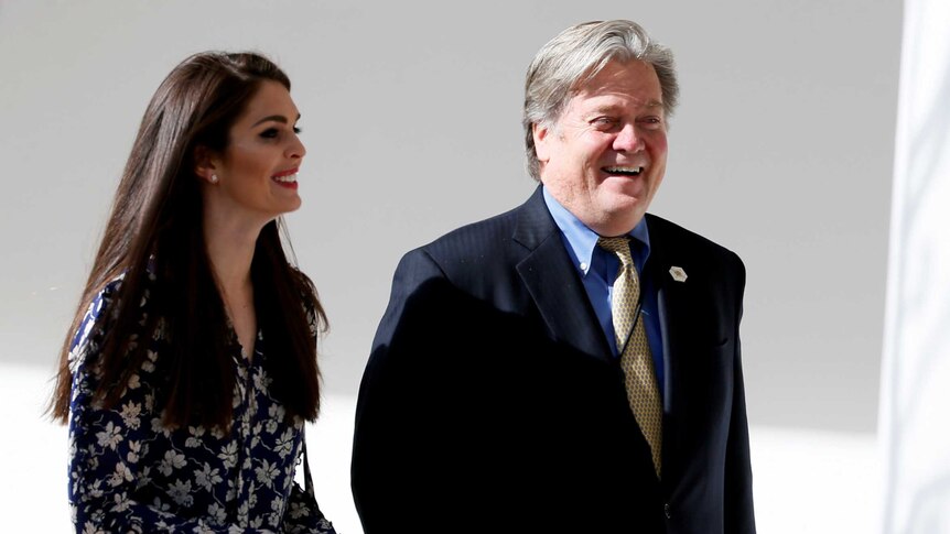 Trump staffers Steve Bannon and Hope Hicks outside the White House