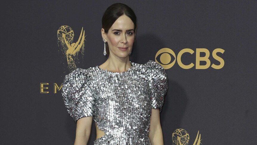Sarah Paulson wears a silver jewelled gown on the red carpet