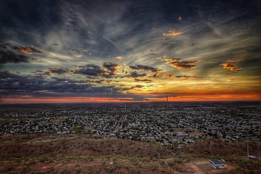 A wide sunset shot of Mount Isa.