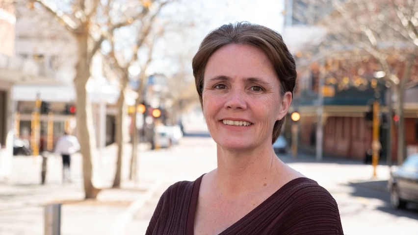 Author and academic Leigh Straw in standing on the street in Northbridge, Perth.