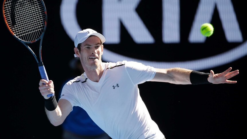 Britain's Andy Murray hits a forehand to Ukraine's Illya Marchenko during their first round match at the 2017  Open.