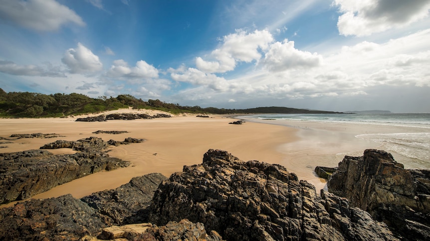 Beach with sand and rocks