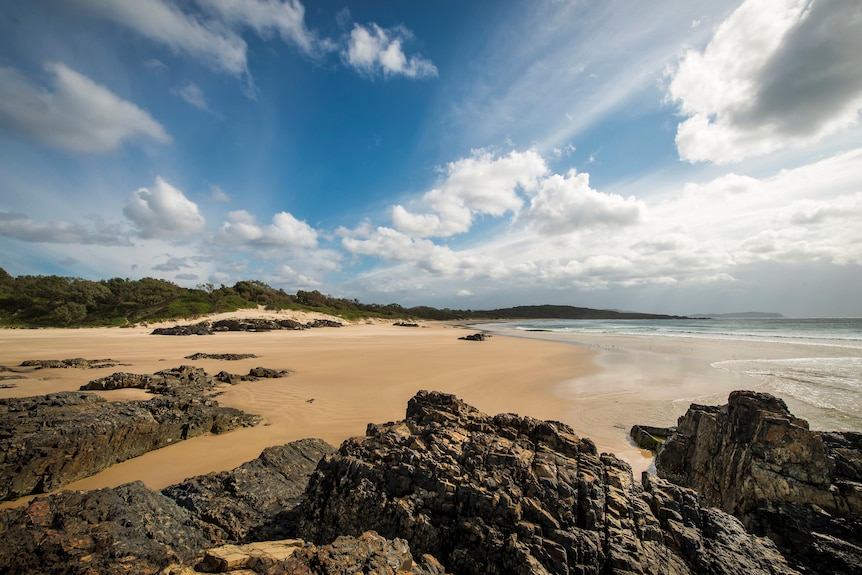 Beach with sand and rocks