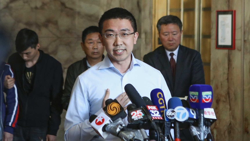 Xiaolin Hou, boyfriend of Yingying Zhang, speaks at a press conference.