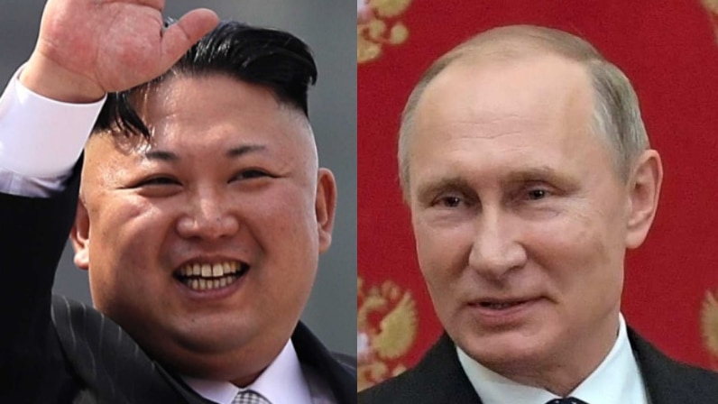 North Korean leader Kim Jong-un, left, waves and Russian President Vladimir Putin, right, smiles.