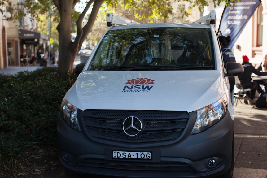 Department of Family and Community Services van parked in Newtown