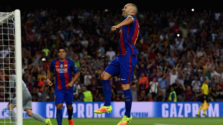 Scoring spree ... Andres Iniesta celebrates scoring Barcelona's fourth goal against Celtic