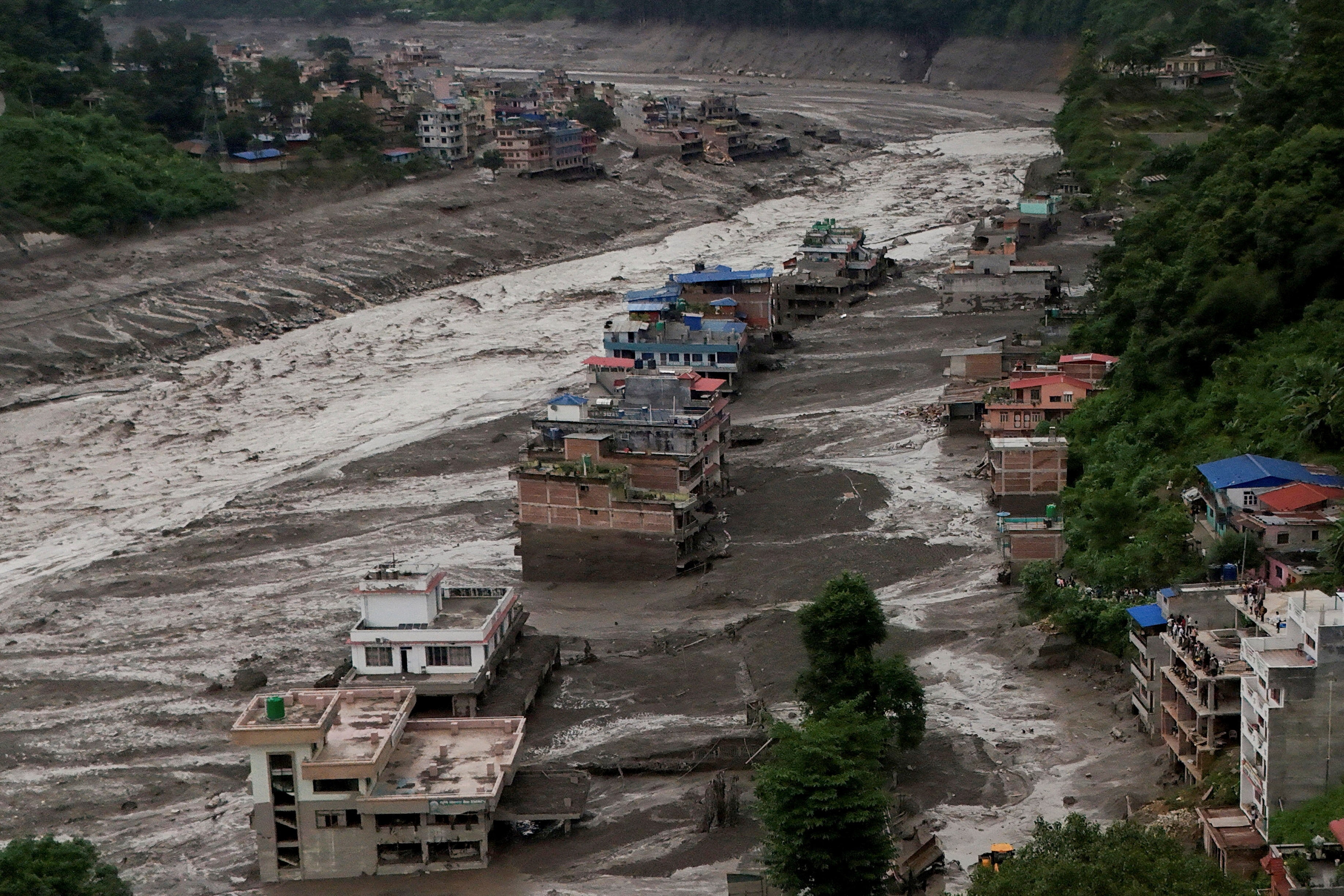 Live: Hundreds missing, including Australians, in deadly Himalayan flash floods